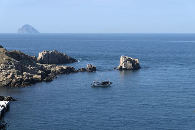 Scenic view of sea against clear sky