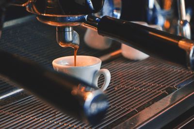 Close-up of coffee cup in cafe