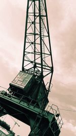 Low angle view of building against cloudy sky