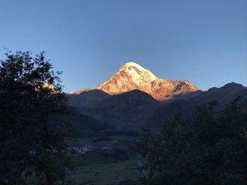 Scenic view of mountains against clear sky