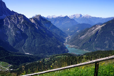 Scenic view of mountains against clear blue sky