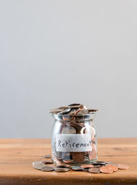 Close-up of coins on table