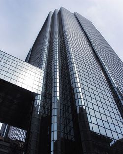 Low angle view of modern building against sky in city