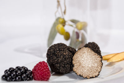 Close-up of berry fruits in plate