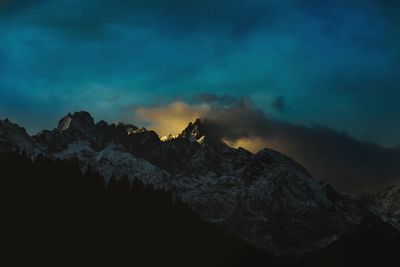 Scenic view of mountains against sky during sunset