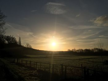 Scenic view of landscape at sunset