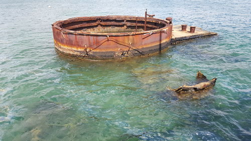 Abandoned boat in water