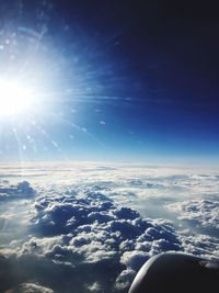 Aerial view of cloudscape over airplane