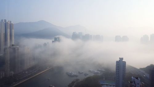 Aerial view of cityscape against sky