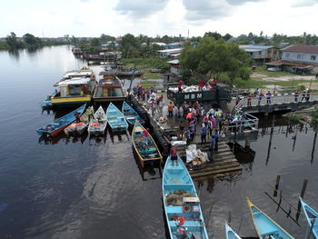 High angle view of boats moored in river