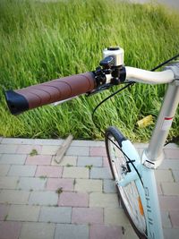 High angle view of bicycle parked on field