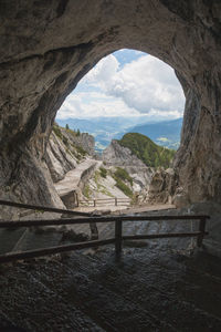 Scenic view of sea seen through arch