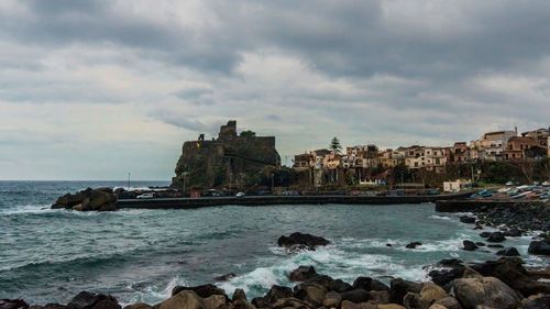 View of sea against cloudy sky