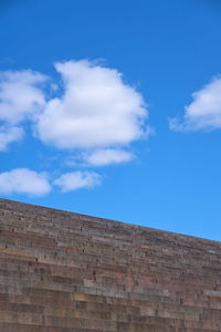 Low angle view of building against blue sky