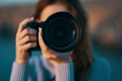 Close-up of person photographing