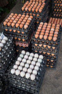 High angle view of eggs in cartons for sale at market