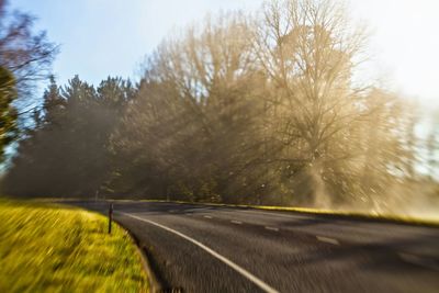 Road passing through field