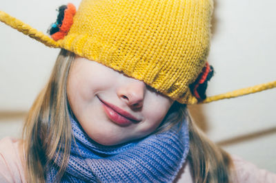 Close-up portrait of a smiling young woman