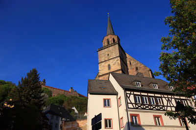 Low angle view of building against blue sky