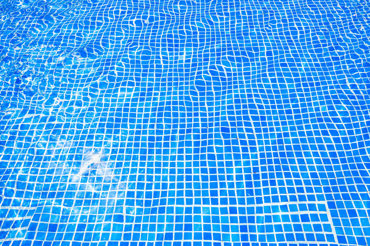 FULL FRAME SHOT OF SWIMMING POOL WITH TILED FLOOR