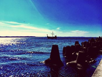 Scenic view of sea against blue sky