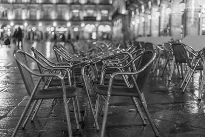 Empty chairs and tables in restaurant