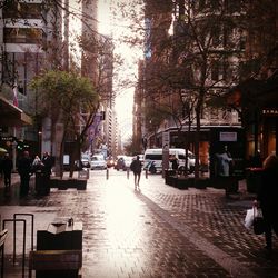 People walking on city street