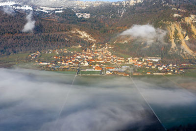 Aerial view of rainbow over buildings