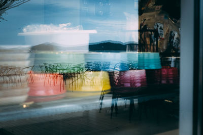 Reflection of window on glass table