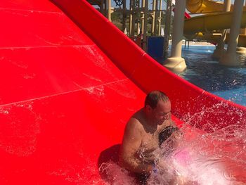 Father and daughter enjoying at water park