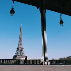 Low angle view of eiffel tower against clear sky