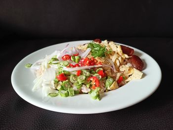 Close-up of salad served on table