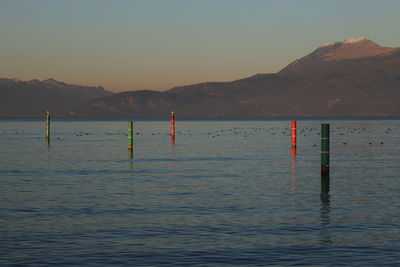 Scenic view of sea against mountains