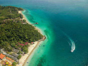 High angle view of boats on sea shore