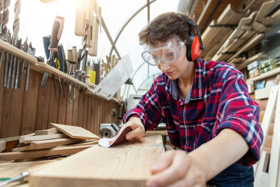 Young man working at table