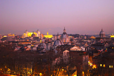 High angle view of illuminated buildings in city