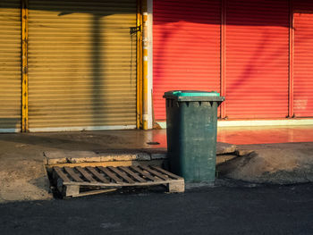 Closed door and gsrbage bin