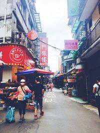 People on street in city