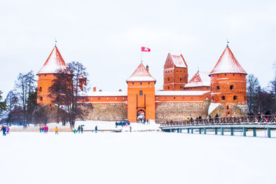 Buildings in city during winter