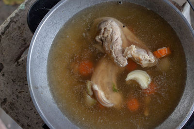High angle view of soup in cooking pan