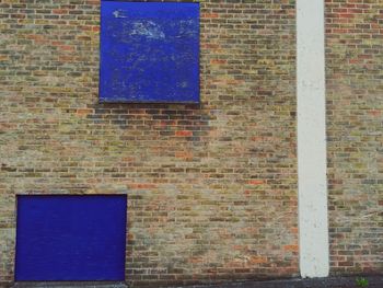 Close-up of window on brick wall