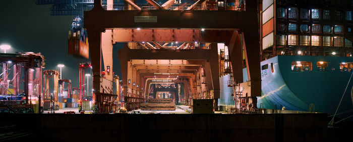 Panoramic view of illuminated building at night