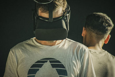 Rear view of people against white background