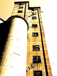 Low angle view of old building against clear sky