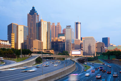 Cityscape of downtown atlanta at sunset with traffic in the freeway, georgia, united states