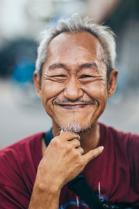 Close-up portrait of a smiling young man