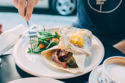 Person having breakfast