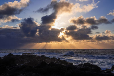 Scenic view of sea against sky during sunset