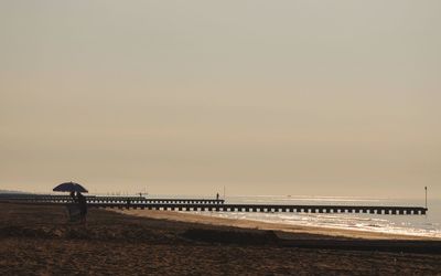 Scenic view of sea against sky at sunset