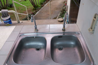 High angle view of faucet on floor